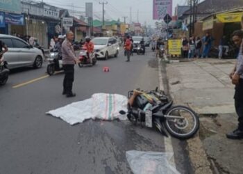 Duuuhh…Hansip Linmas Tewas Terlindas Truk Tronton